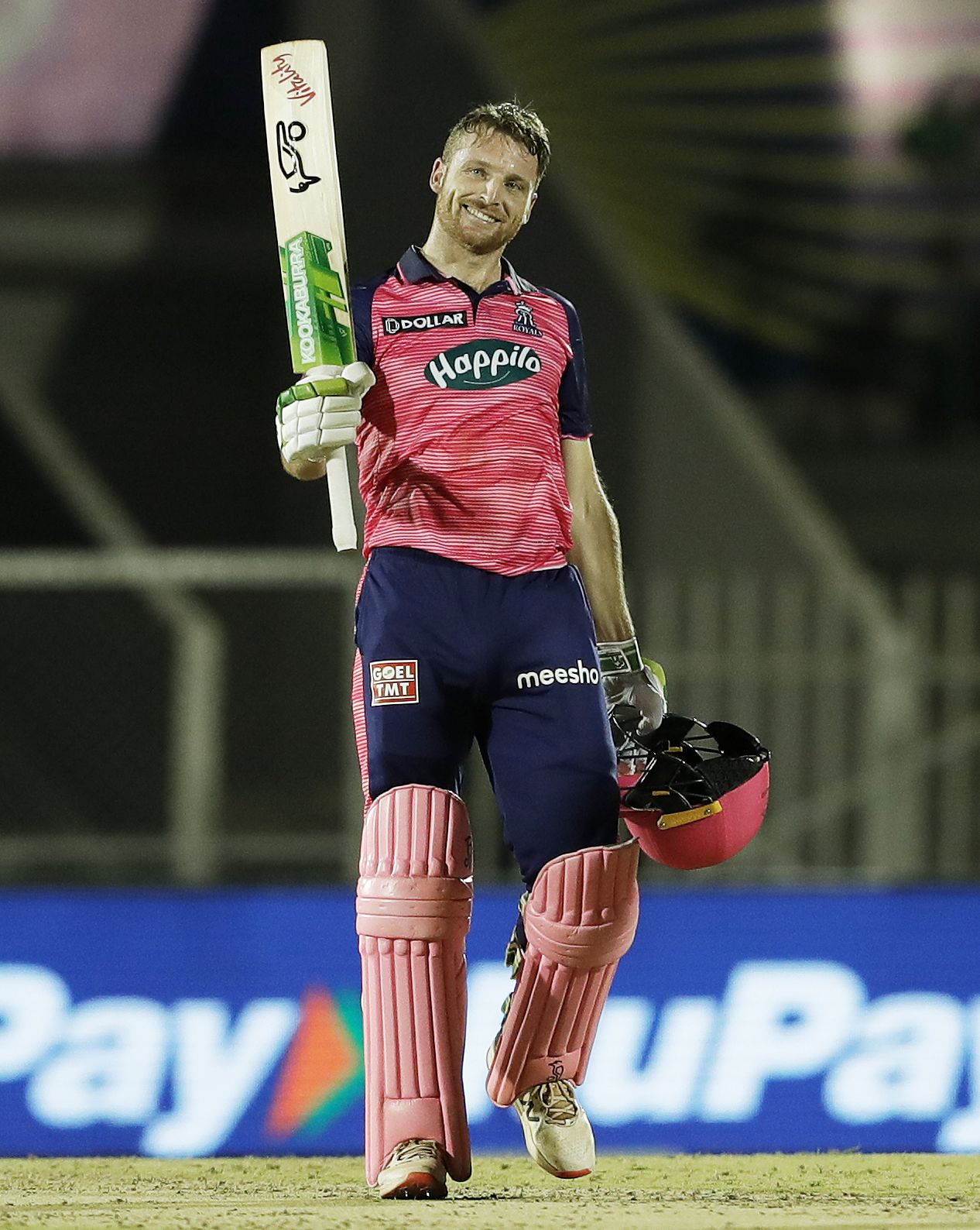Jos Buttler flashes a smile after bringing up his second century of the  season 