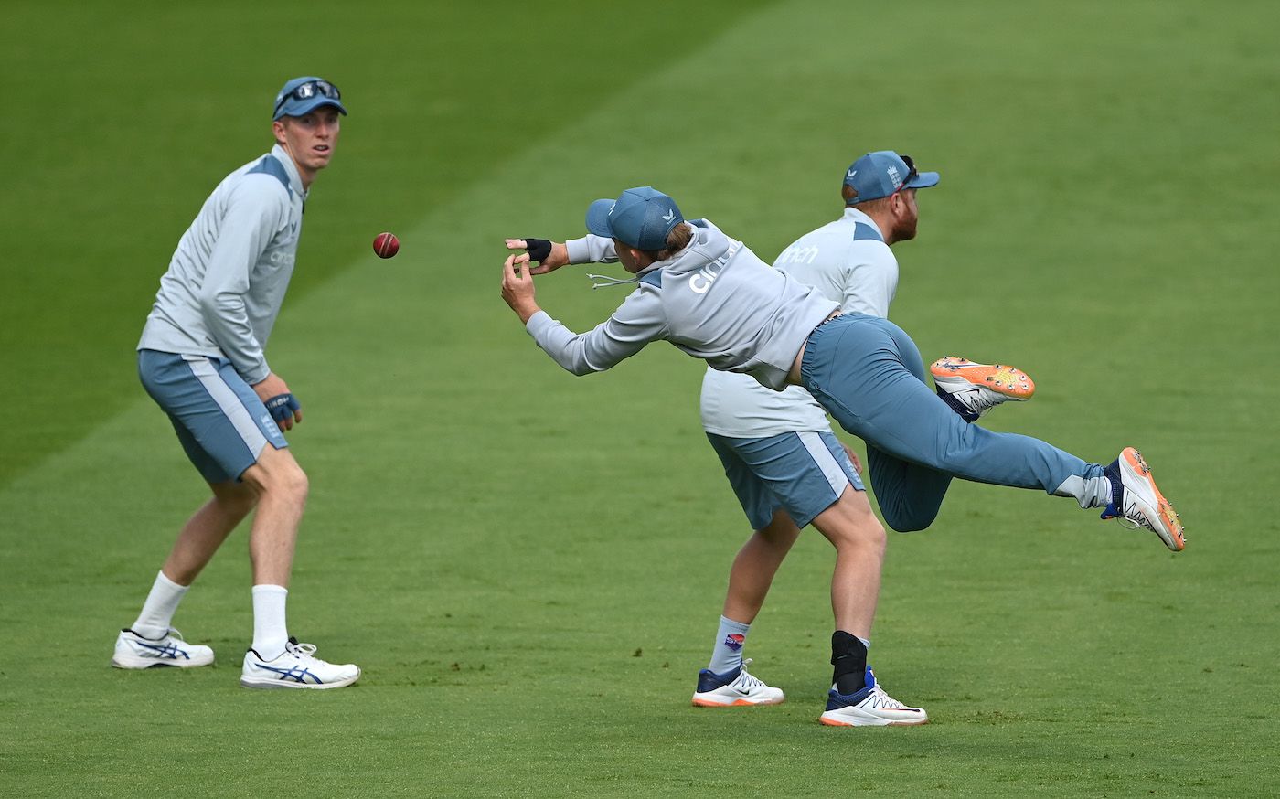 Ollie Pope flies across as he attempts unsuccessfully a slip catch