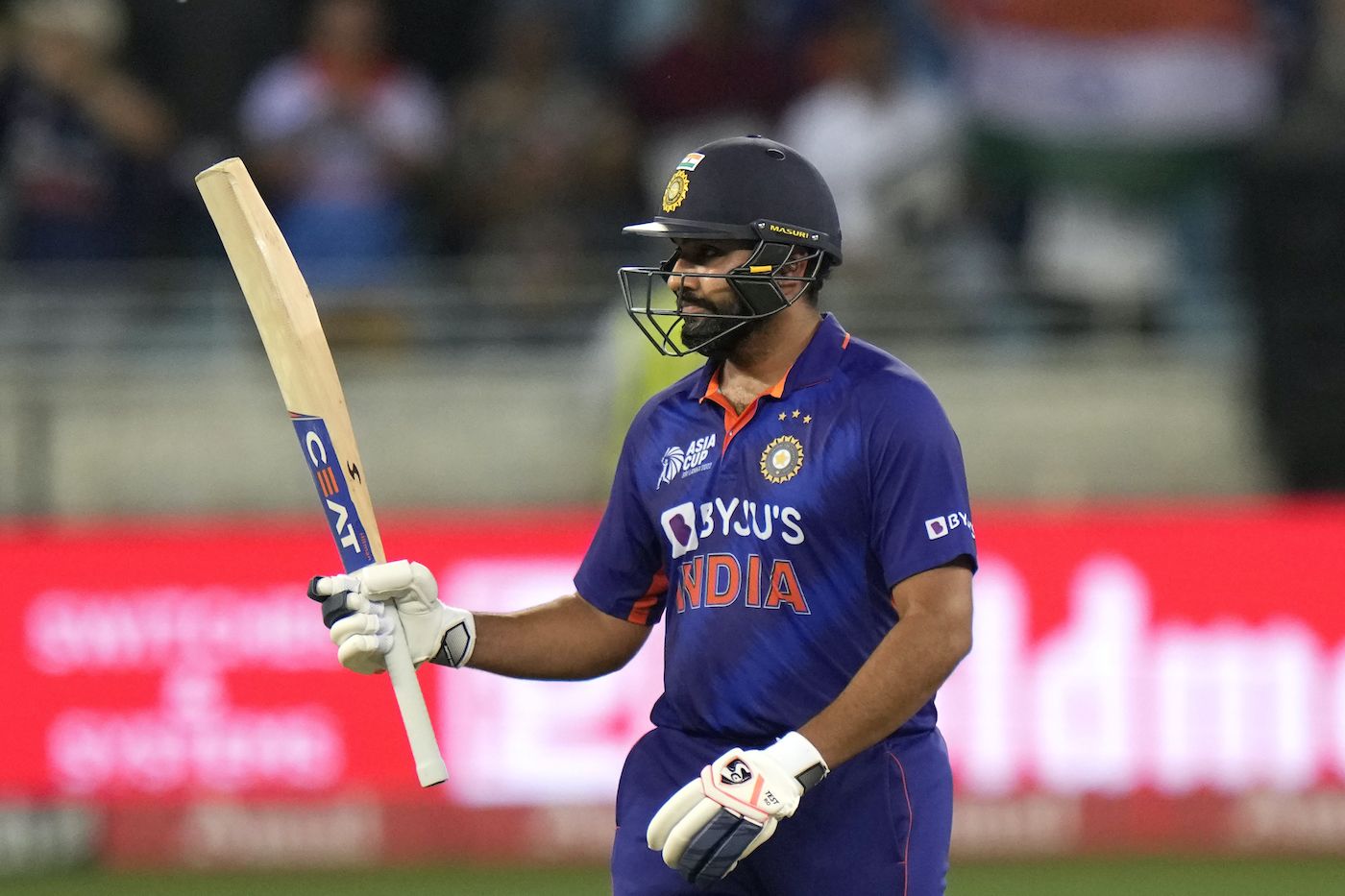 Rohit Sharma celebrates after getting to his fifty | ESPNcricinfo.com
