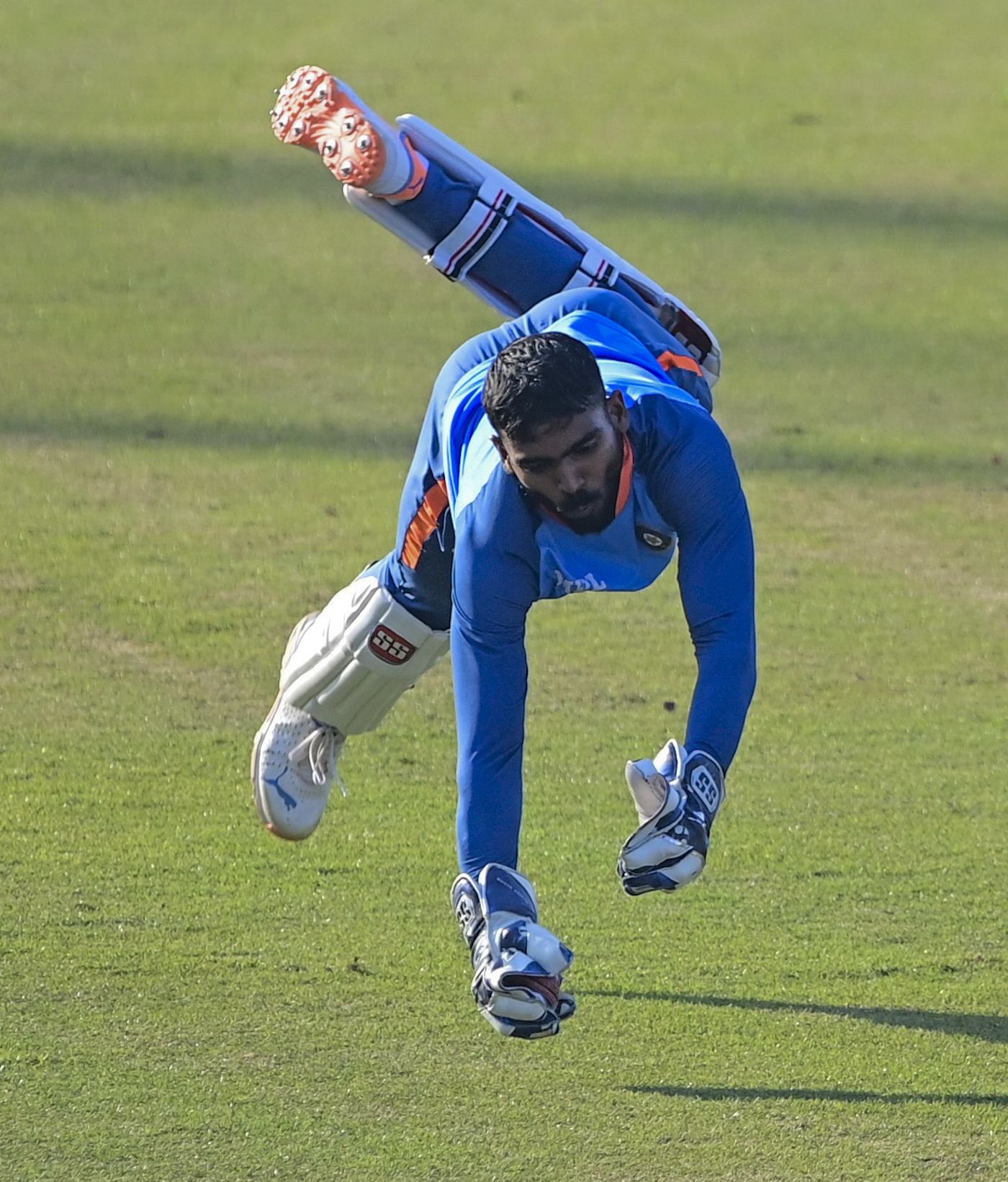 KS Bharat dives at a training session ahead of the first Test against