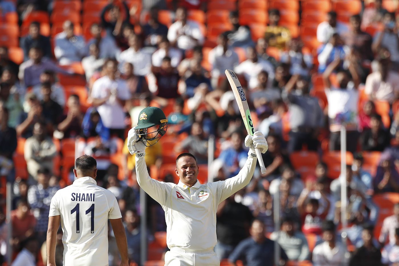 Usman Khawaja soaks in the applause for his hundred