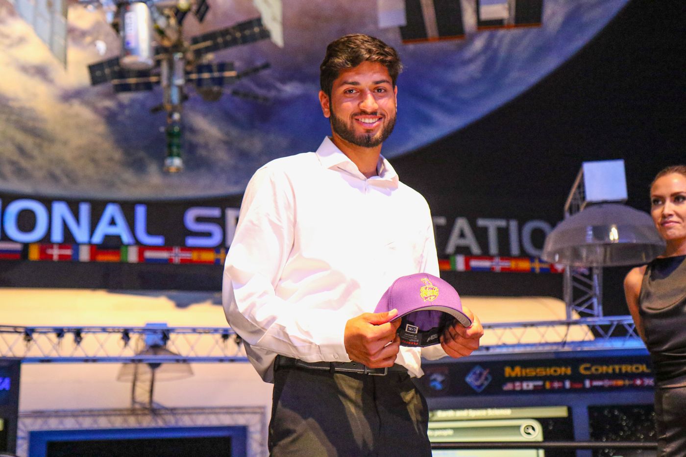 Ali Sheikh accepts his LA Knight Riders cap after being taken in the ...