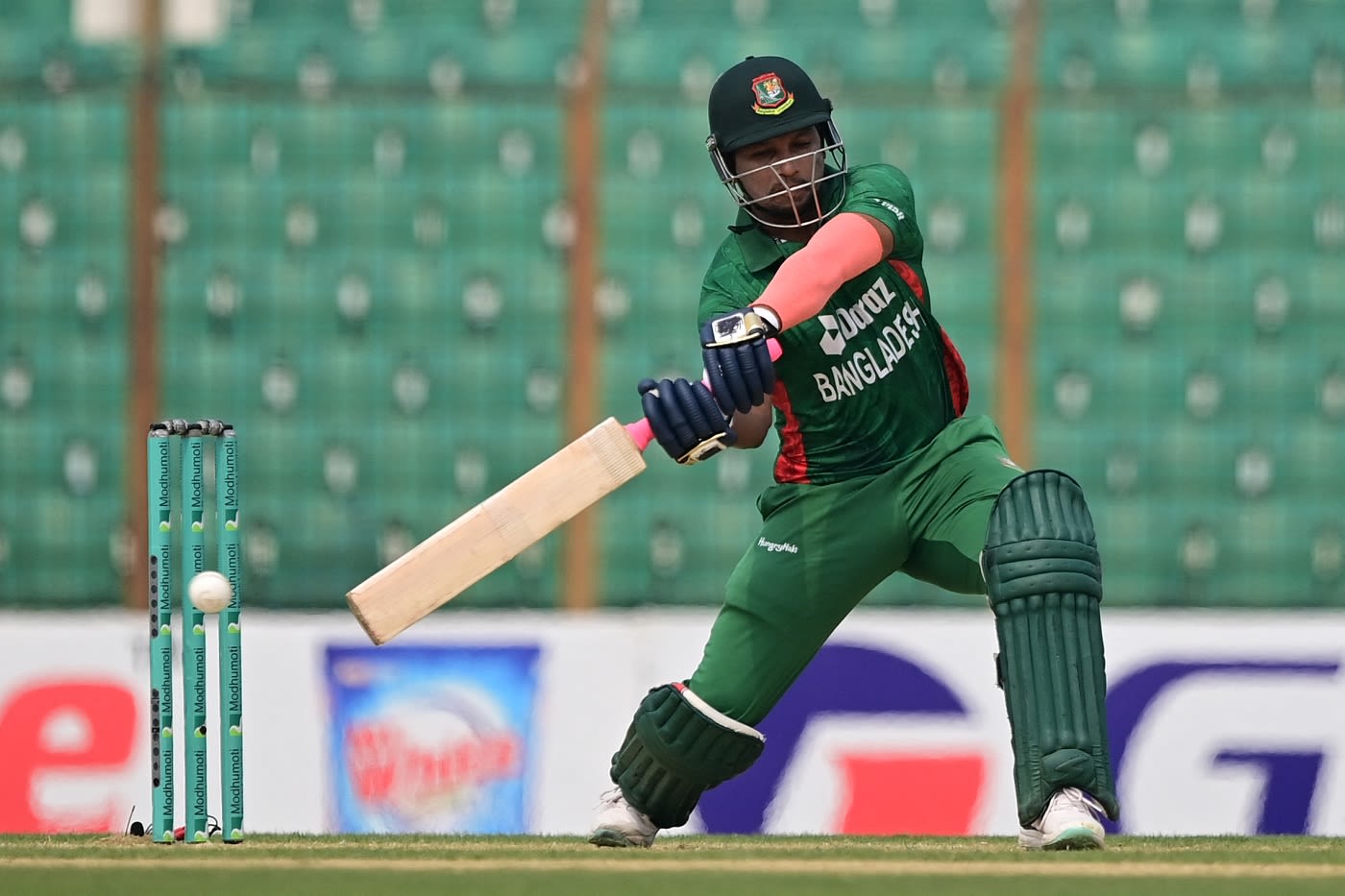 Rony Talukdar prepares to dispatch the ball | ESPNcricinfo.com