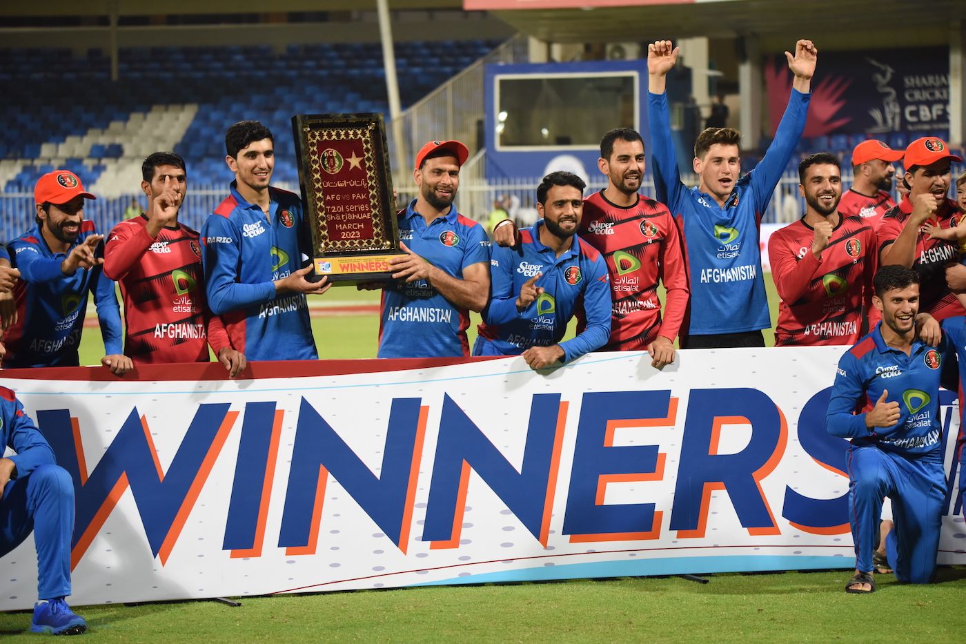 the-afghanistan-players-pose-with-the-trophy-espncricinfo
