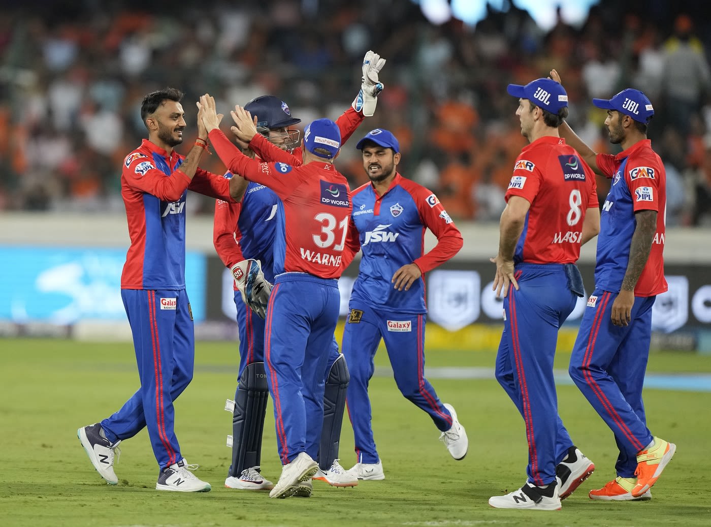 Axar Patel is mobbed by his team-mates | ESPNcricinfo.com