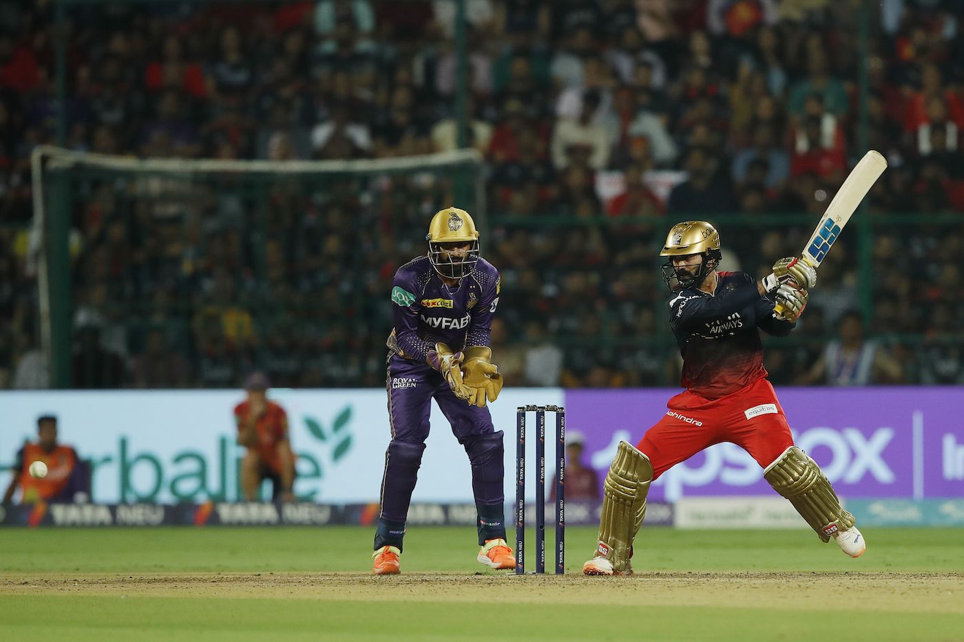 Dinesh Karthik struggled to get the big hits going early on ...