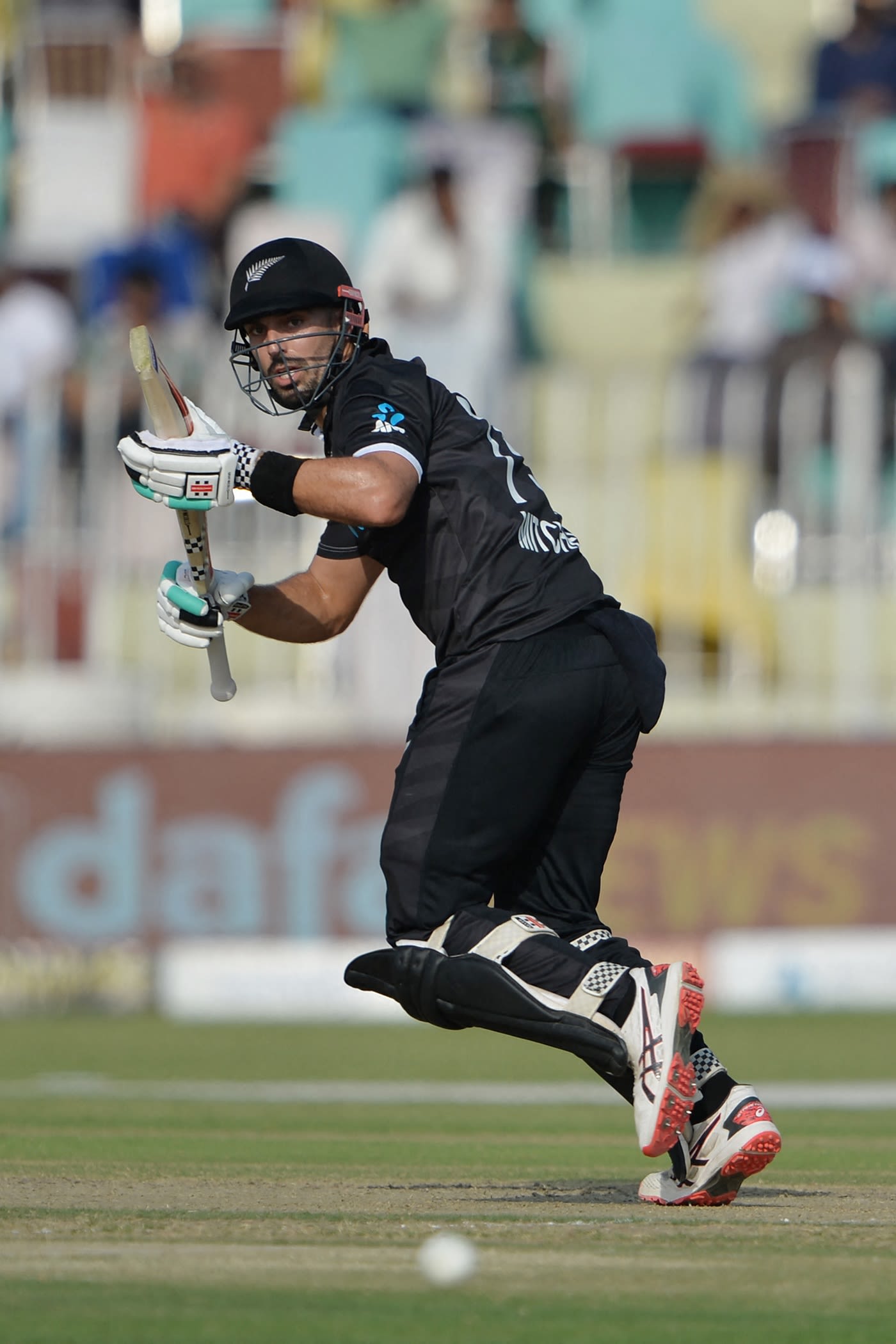 Daryl Mitchell sets off for a run