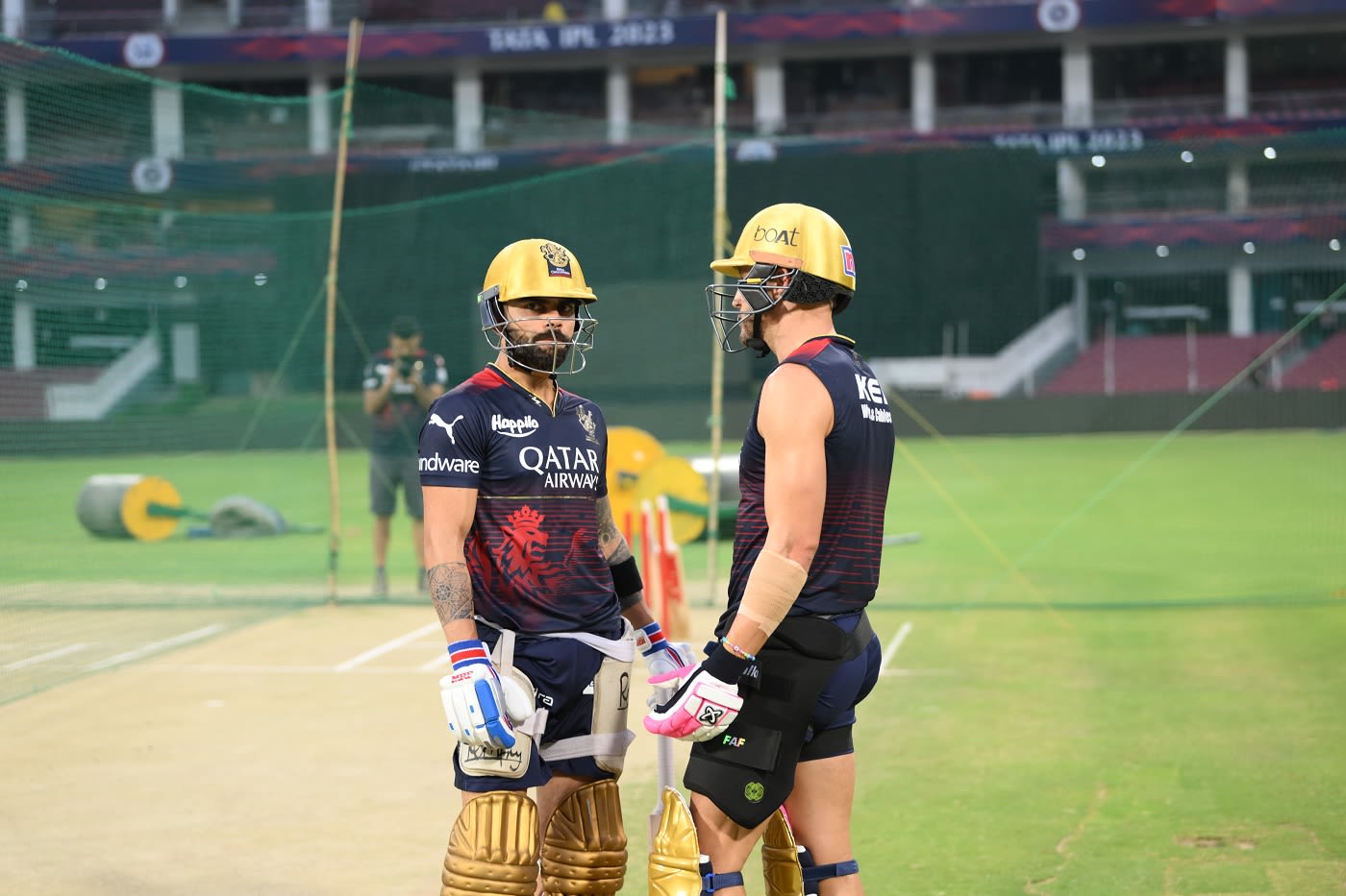 Faf du Plessis and Virat Kohli involved in a discussion during a ...