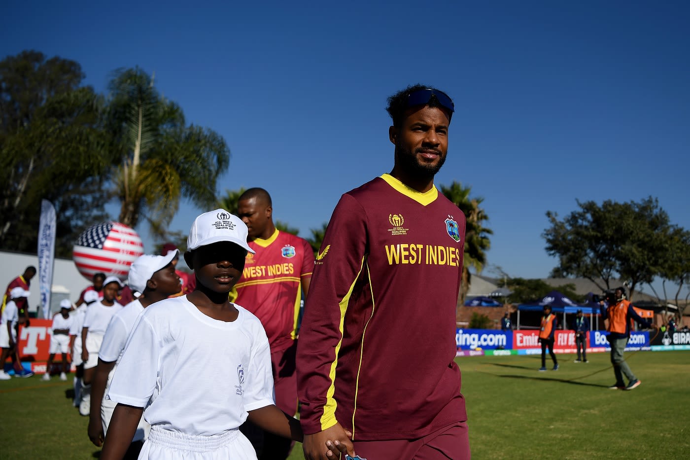 Shai Hope walks onto the pitch