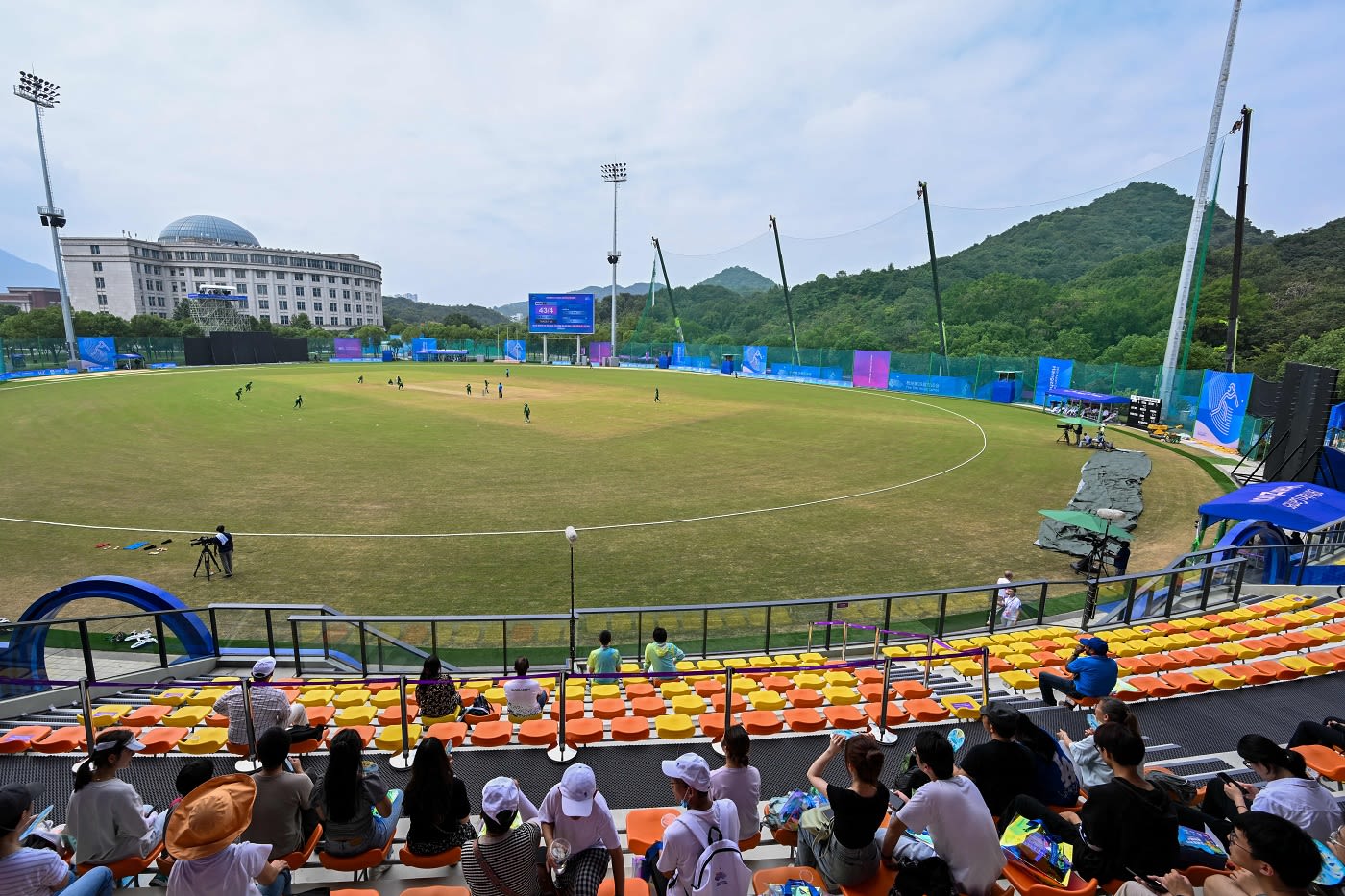 Spectators watch the Pakistan-Bangladesh bronze-medal playoff in the