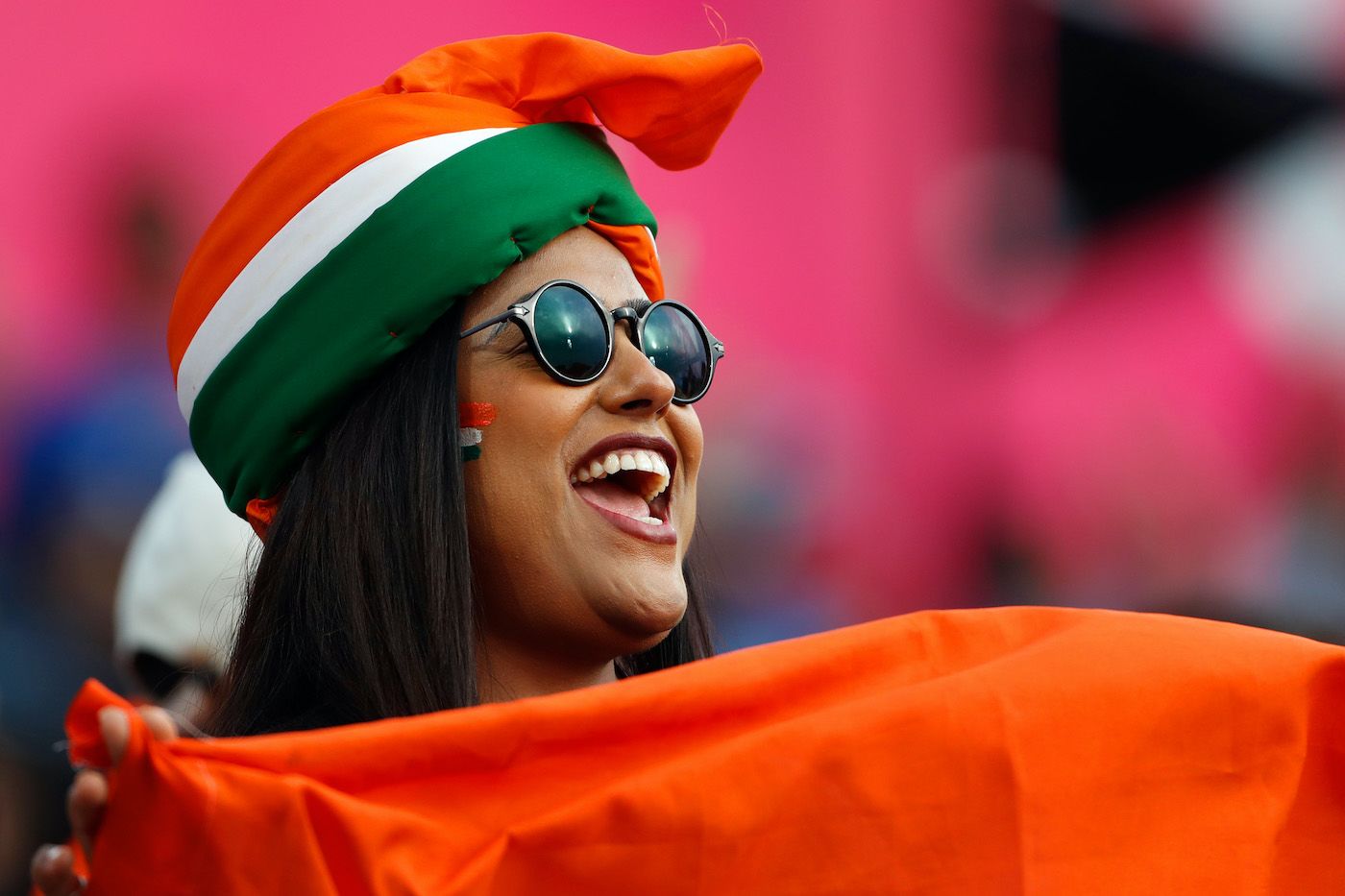 An Indian fan in Dharamsala is dressed up for the occasion ...