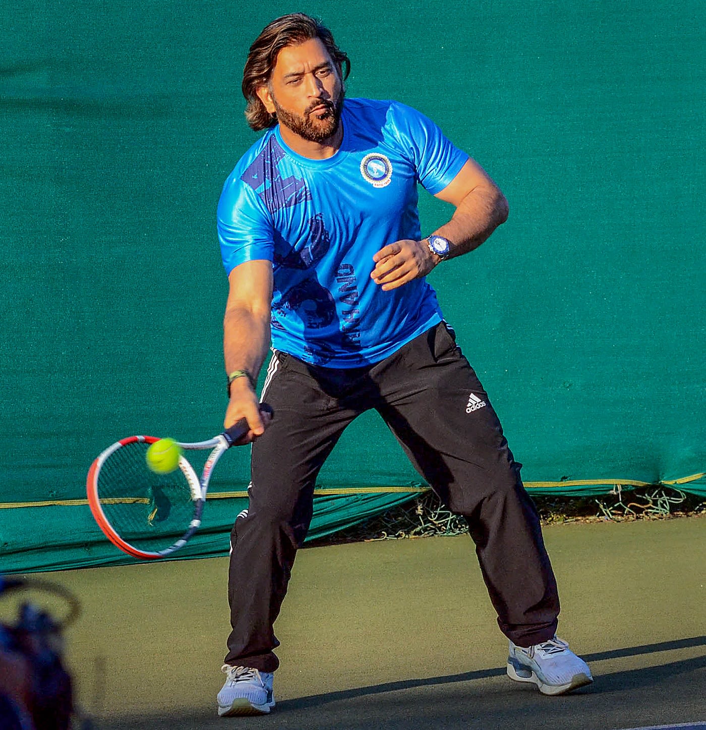 MS Dhoni in action at a tennis tournament in Ranchi