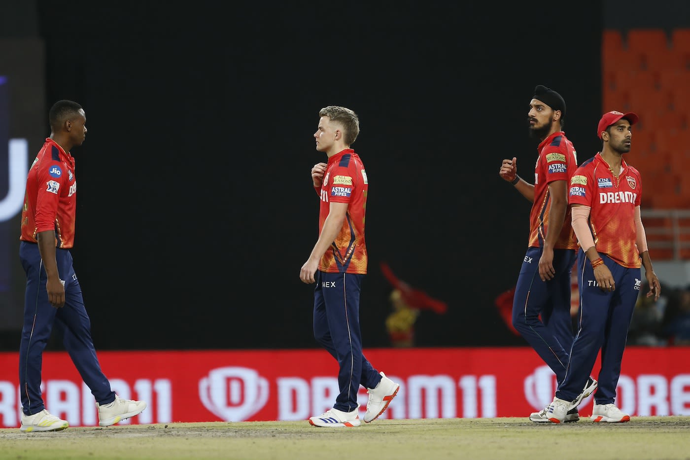 The Punjab Kings players wear a dejected look after the loss ...