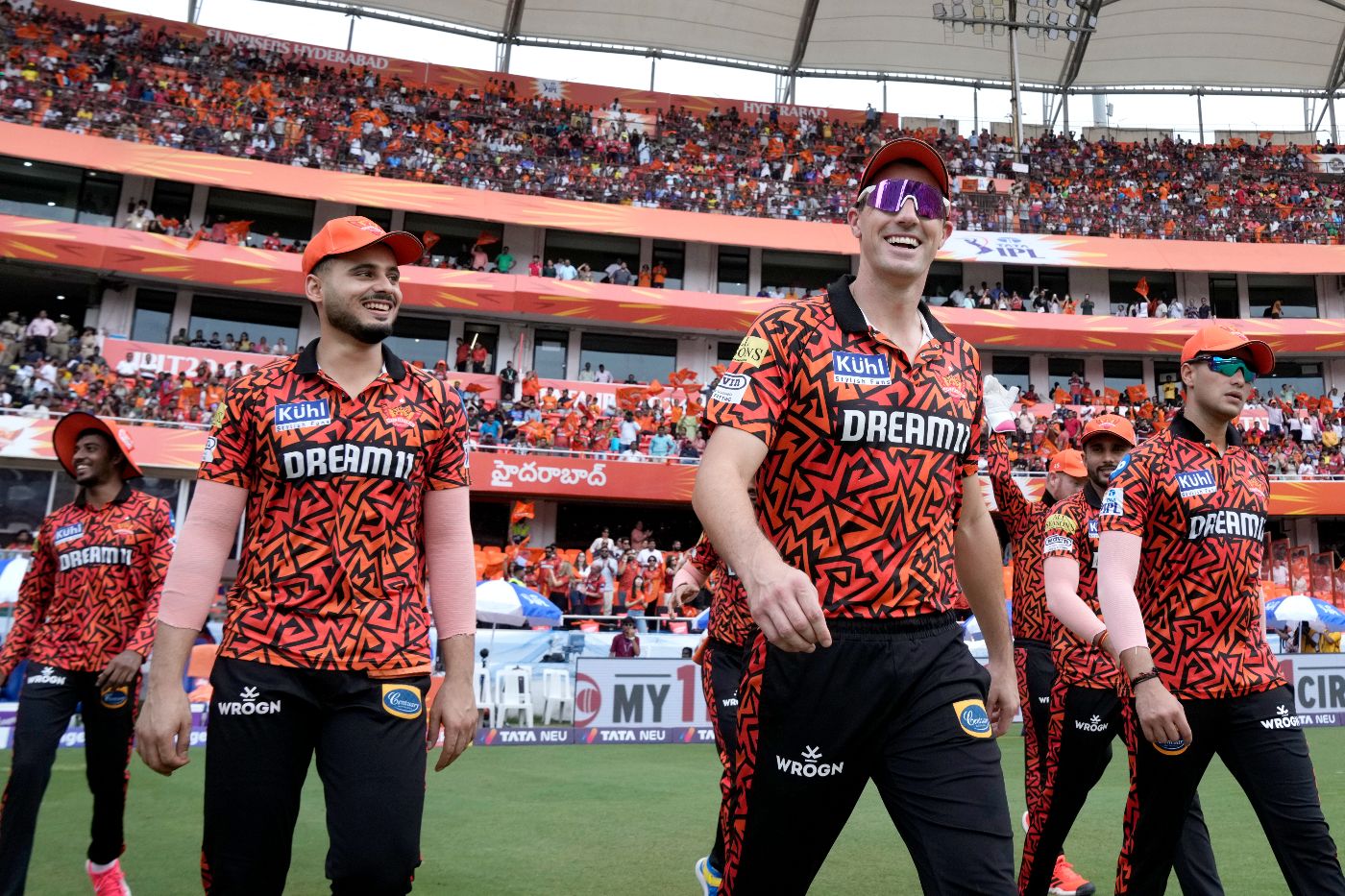 A smiling Pat Cummins leads his Sunrisers Hyderabad unit out ...