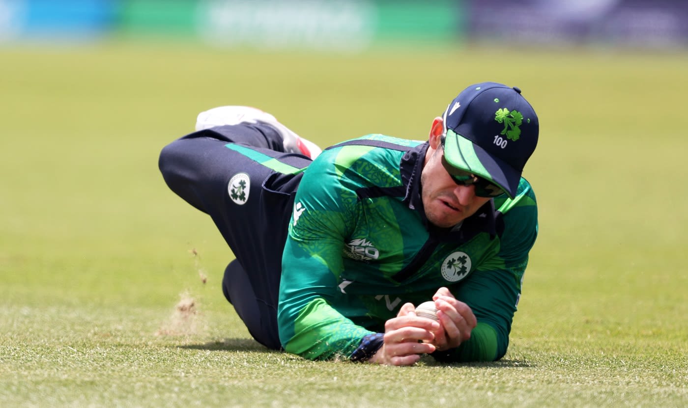 Dockrell George Dockrell completes a catch to dismiss Suryakumar Yadav ...
