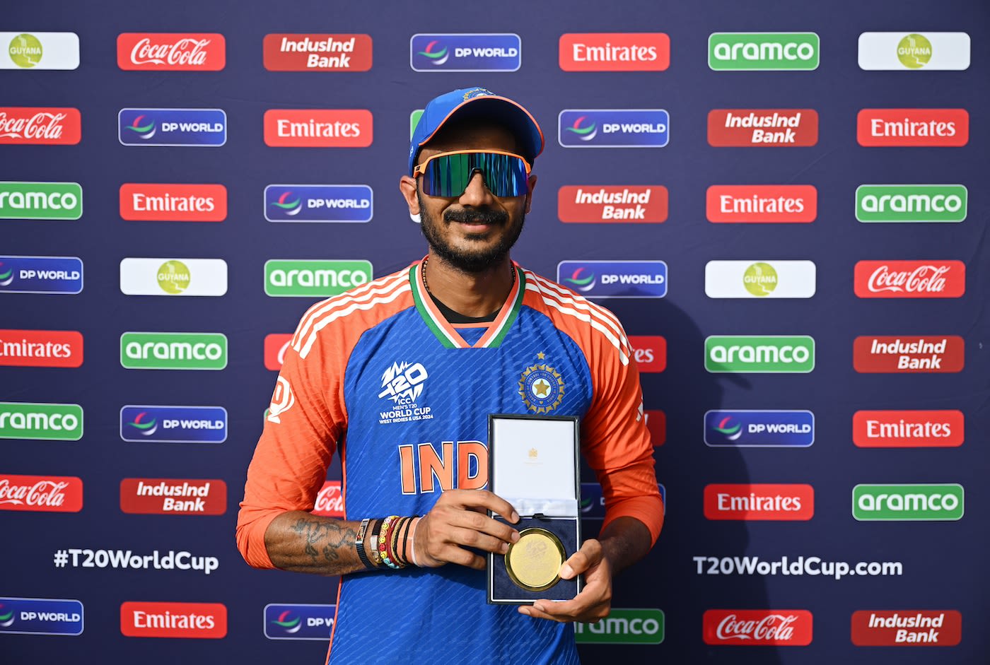 Axar Patel was named the Player of the Match for his three early ...