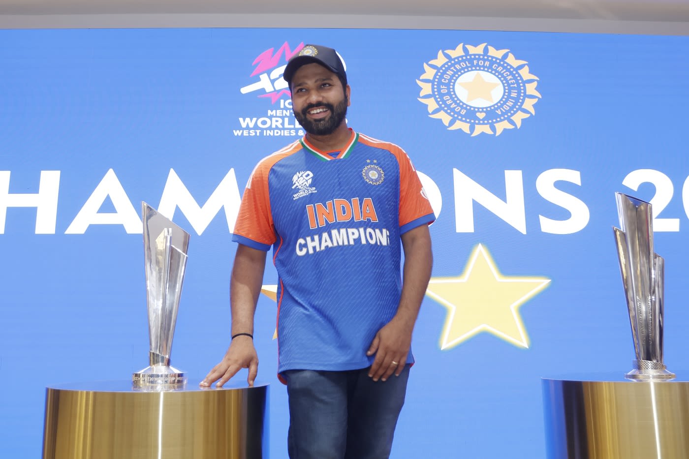 Rohit Sharma is all smiles with the World Cup trophy | ESPNcricinfo.com