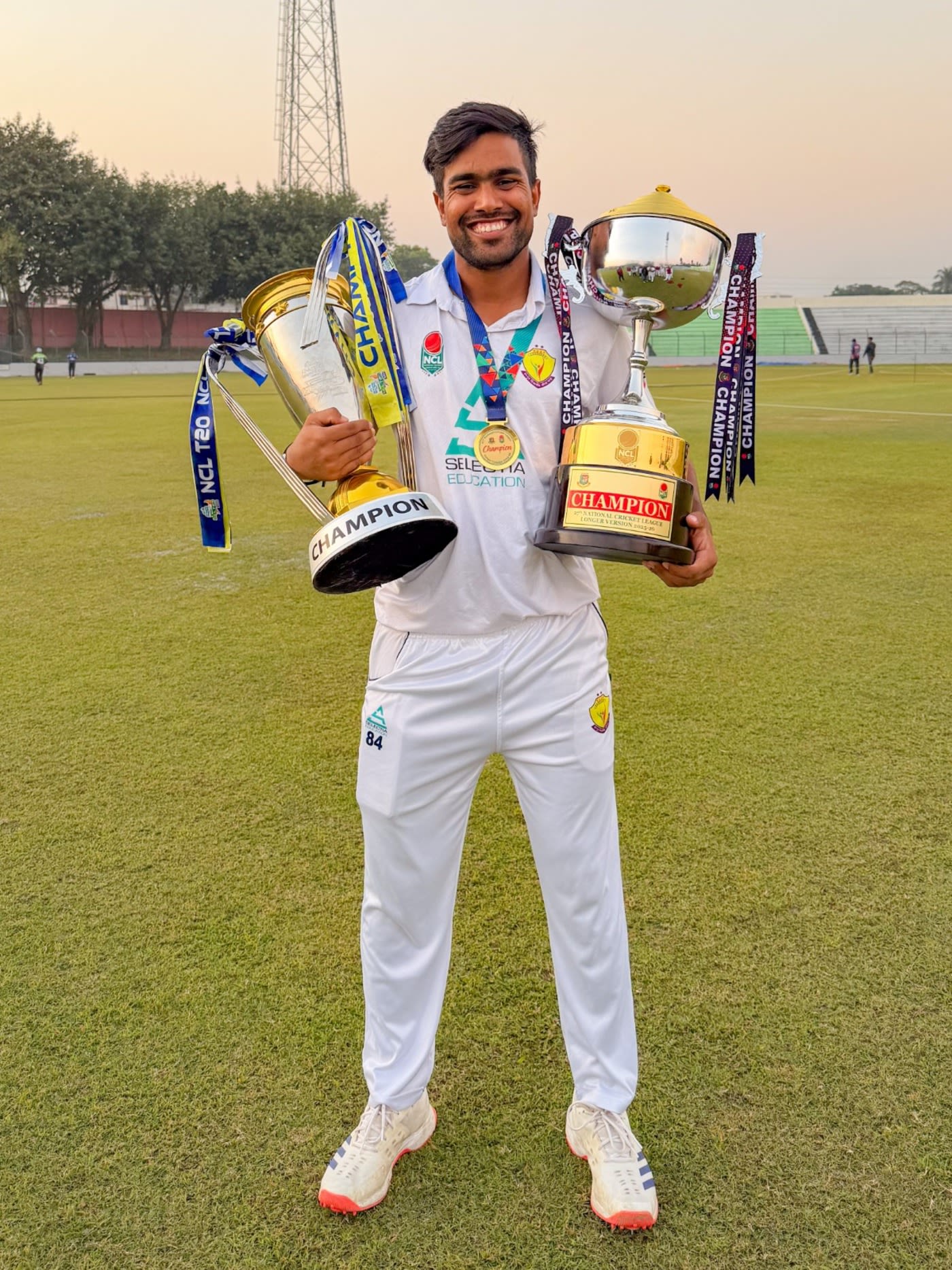 Akbar Ali with both NCL T20 and first-class trophies | ESPNcricinfo.com