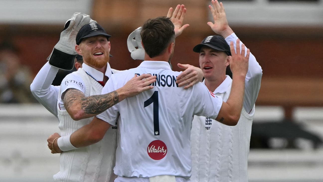Robinson double-strike moves England closer between showers