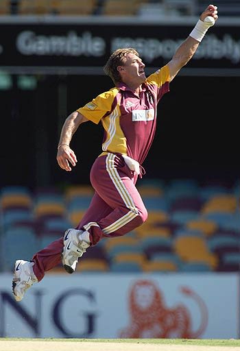 Andrew Bichel does a giant leap to field the ball off his own bowling ...