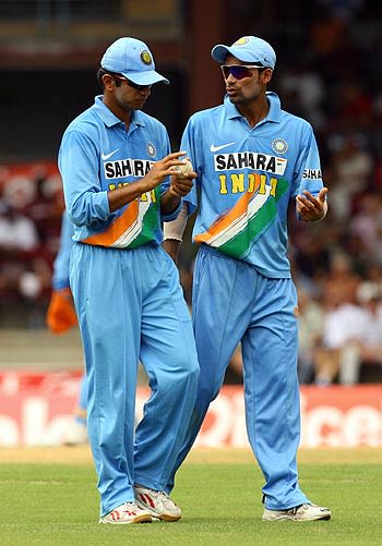 Rahul Dravid and Mohammad Kaif ponder a fielding position ...