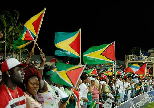 Guyana celebrating soccer victory with fans