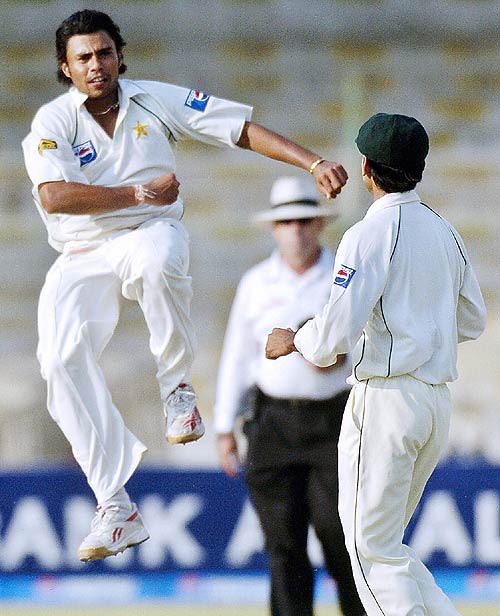 Danish Kaneria Punctuates One Of His Three Scalps On Day Two ...