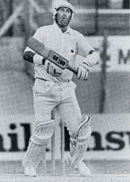 Graham Gooch recoils in pain after having his hand broken