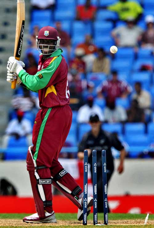 Chris Gayle drags one onto his stumps off Jacob Oram | ESPNcricinfo.com