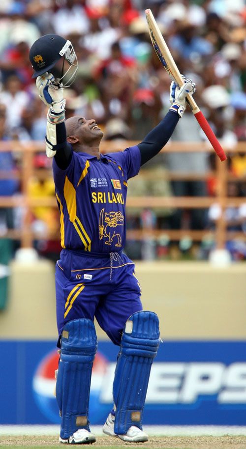 Sanath Jayasuriya looks skywards after reaching his century ...