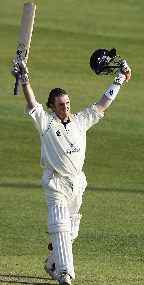 Ian Harvey celebrates his century