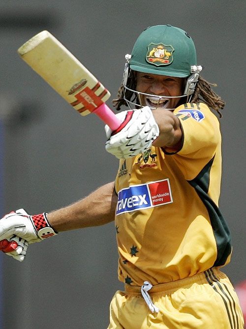 Andrew Symonds signals to his teammates after reaching his century