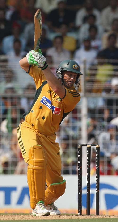 Adam Gilchrist slashes the ball through the off side