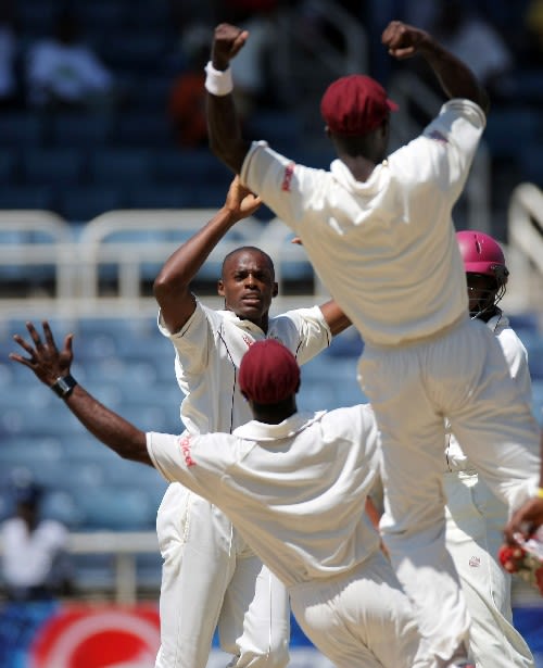 Daren Powell celebrates the wicket of Mitchell Johnson | ESPNcricinfo.com