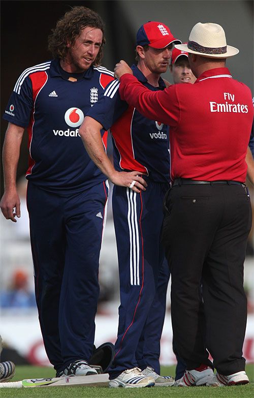 Umpire Mark Benson gives Paul Collingwood a chance to reconsider his