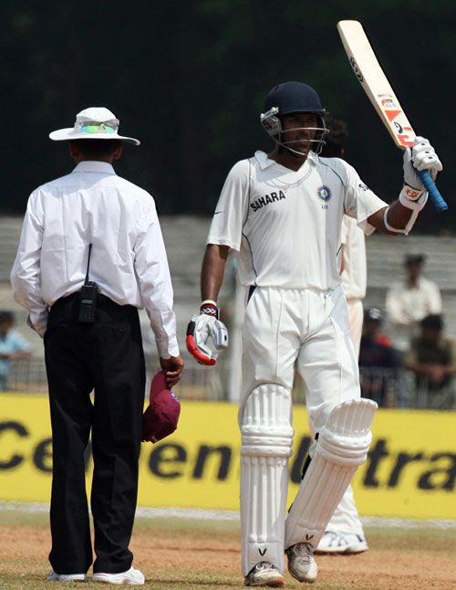 Wasim Jaffer acknowledges the crowd on reaching his fifty ...