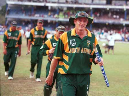 A happy Shaun Pollock leads off his victorious team | ESPNcricinfo.com